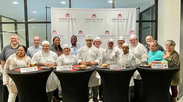 group photo of students, judges, Dugans